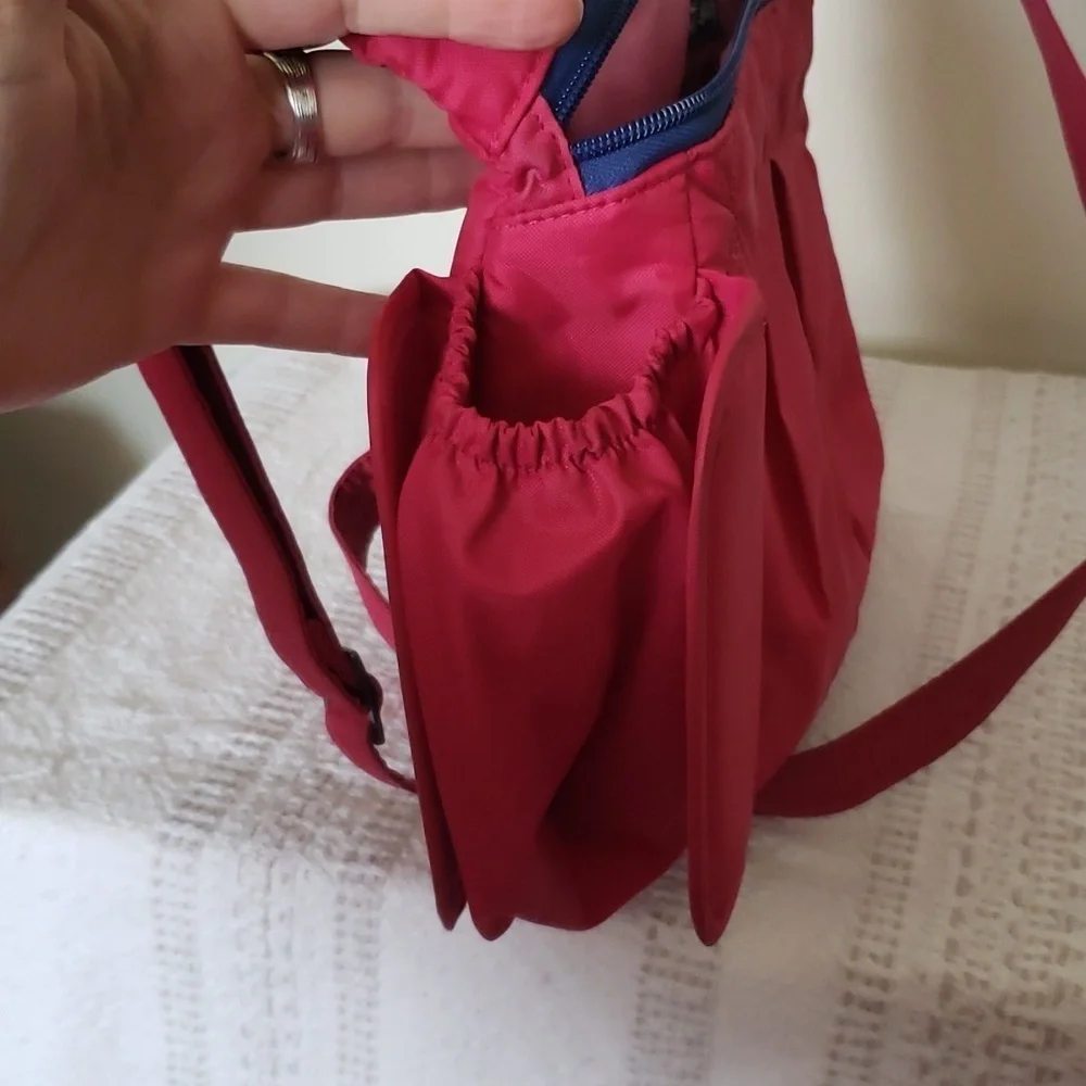 Lug 'swing' crossbody bag, hot pink, 3 sectioned pockets.